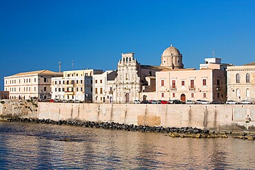 View across bay to the waterfront, early morning, Ortygia (Ortigia), UNESCO World Heritage Site, Syracuse (Siracusa), Sicily, Italy, Europe