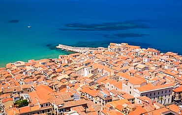 View over the colourful tiled rooftops of the Old Town from La Rocca, Cefalu, Palermo, Sicily, Italy, Mediterranean, Europe