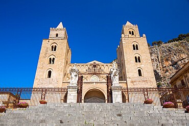 Low angle view of the 12th century Arab-Norman cathedral from Piazza del Duomo, UNESCO World Heritage Site, Cefalu, Palermo, Sicily, Italy, Mediterranean, Europe