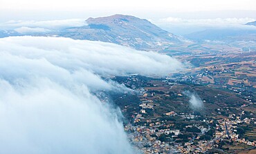 View over surrounding landscape from the city walls, clouds drifting across valley, Erice, Trapani, Sicily, Italy, Mediterranean, Europe