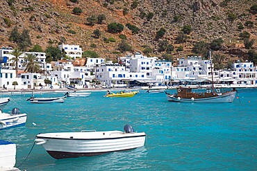 View across the turquoise waters of the harbour, Loutro, Hania (Chania), Crete, Greek Islands, Greece, Europe