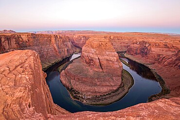 View from cliff edge over the Colorado River at Horseshoe Bend, dawn, Glen Canyon National Recreation Area, Page, Arizona, United States of America, North America