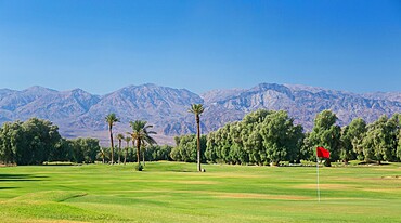 View to the Panamint Range from the world's lowest-lying golf course, Furnace Creek, Death Valley National Park, California, United States of America, North America