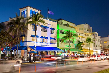 Colourful hotel facades illuminated by night, Ocean Drive, Art Deco Historic District, South Beach, Miami Beach, Florida, United States of America, North America