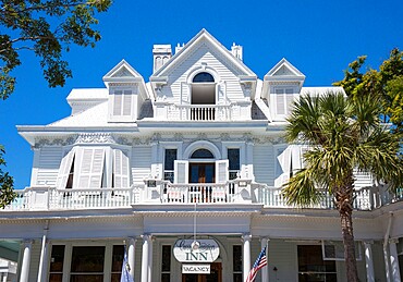 Brilliant white facade of the historic Curry Mansion, now a guest house, Old Town, Key West, Florida Keys, Florida, United States of America, North America