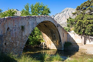 Ancient stone bridge over the Megalopotamos River, Preveli, near Plakias, Rethymno (Rethymnon), Crete, Greek Islands, Greece, Europe