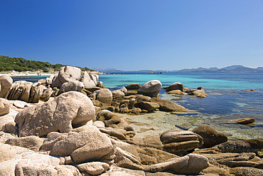 View across tranquil Cala Volpe, granite rocks on shore, La Celvia, Arzachena, Sassari, Sardinia, Italy, Mediterranean, Europe