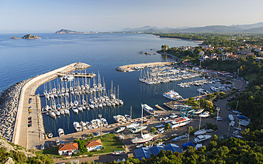 View over the marina and coastline to distant Arbatax and Capo Bellavista, Santa Maria Navarrese, Baunei, Nuoro, Sardinia, Italy, Mediterranean, Europe