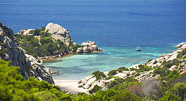 View from rocky hillside over the calm turquoise waters of Cala Napoletana, Caprera Island, La Maddalena Archipelago National Park, Sassari, Sardinia, Italy, Mediterranean, Europe