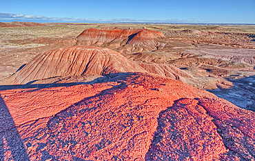 Red hills of bentonite clay overlooking Dead Wash in Petrified Forest National Park Arizona.