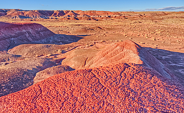 Red hills of bentonite clay overlooking Dead Wash in Petrified Forest National Park Arizona.