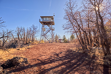 The fire watchtower on the summit of Apache Maid Mountain in the Coconino National Forest of Arizona. The tower is public property and open to the public. No property release is needed.