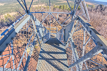 Fisheye view from the 2nd deck of the fire watchtower on the summit of Apache Maid Mountain in the Coconino National Forest of Arizona. The tower is public property and open to the public. No property release is needed.