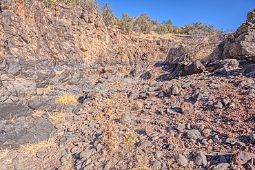 Basalt boulders and cliffs in a section of Johnson Canyon just east of the Bainbridge Steel Dam Lake near Ash Fork Arizona in the Kaibab National Forest.