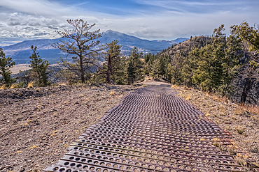 End of the Forest Service Road that leads to the O'Leary Peak Watchtower and Overlook. The metal grating is to add traction for vehicles. Adjacent to Sunset Crater National Monument Arizona in the Coconino National Forest.