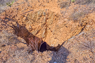 Open mine shaft at the Richinbar Mine within the Agua Fria National Monument north of Black Canyon City Arizona. Mine was established in 1905 but was abandoned in 1940 when the company that owned it went bankrupt.