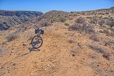 A bicycle parked near the abandoned Richinbar Mine in the Agua Fria National Monument.