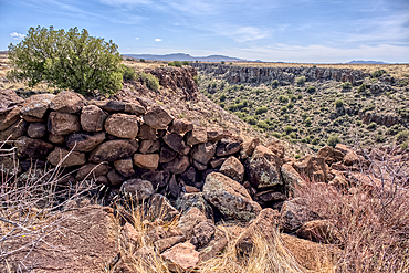 Ancient wall of the Fort Silver Indian Ruins overlooking Silver Creek Canyon in Agua Fria National Monument of Arizona. Located near the Pueblo La Plata ruins.