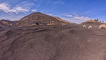 Volcanic cinder hills in Coconino National Forest near Sunset Crater National Monument of Arizona.