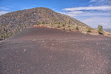 O'Leary Peak viewed from a Volcanic cinder rim slope in Coconino National Forest near Sunset Crater National Monument of Arizona.