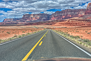 Vermilion Cliffs National Monument Arizona viewed thru the windshield of a moving vehicle traveling on highway US89A.