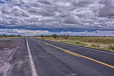 Storm clouds building over Arizona State Route 64 that runs between Williams and Grand Canyon National Park.