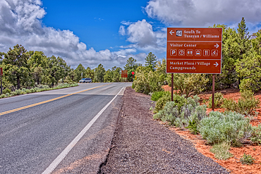 A sign along State Route 64 in Arizona directing travelers in Grand Canyon National Park.