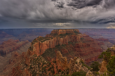 Storm rolling over Grand Canyon viewed from North Rim Arizona. The butte directly ahead is Wotans Throne.