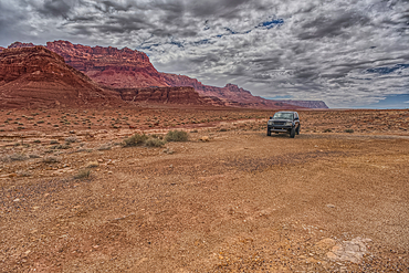 Vehicle parked next to Jackass Creek off of US89A near Echo Cliffs on the way to Vermilion Cliffs Arizona. Located on the Navajo Indian Reservation between Bitter Springs and Marble Canyon.