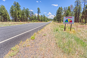 Taken on July 3rd, 2025, a warning sign of high wildfire danger along Highway 67 near Jacob Lake on the way to Grand Canyon North Rim Arizona. On July 4th, 2025, a massive wildfire broke out in this area from a lightning strike.