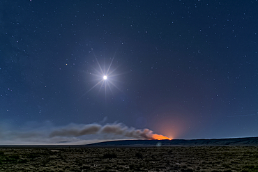 Dragon Bravo Wildfire on Grand Canyon North Rim viewed from US89A near Vermilion Cliffs Arizona at night under moonlight.