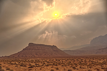Sun shining thru dense smoke from the Dragon Bravo Wildfire enshrouding Vermilion Cliffs National Monument Arizona. Viewed from US89A.