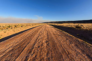 Smoke from the Dragon Bravo Wildfire burning on Grand Canyon North Rim billowing off the Kaibab Plateau. Viewed north of US89A across from Vermilion Cliffs.