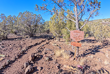 The Stone to Steel Trailhead, also known as Fay's Trail, that runs between the Stone Dam and the historic Bainbridge Steel Dam near Ash Fork Arizona. Located in the Kaibab National Forest. Sign is on public land. No property release needed.