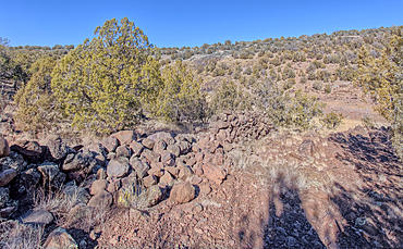 The remains of a rock wall built by ancient Indians along the Stone to Steel Trail that runs between the historic Stone Dam and Bainbridge Steel Dam near Ash Fork Arizona.