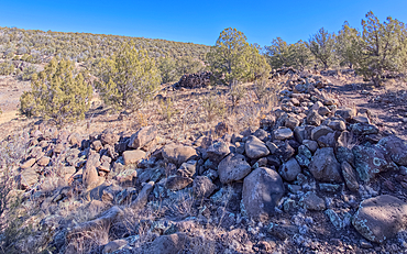The remains of a rock wall built by ancient Indians along the Stone to Steel Trail that runs between the historic Stone Dam and Bainbridge Steel Dam near Ash Fork Arizona.