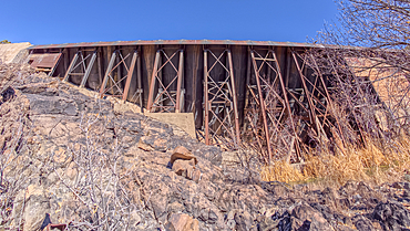 View from below the historic Bainbridge Steel Dam near Ash Fork Arizona in the Kaibab National Forest. It was originally constructed in the late 1800s and is now a historic landmark that is open to the public.