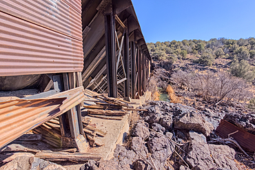 View from below the historic Bainbridge Steel Dam near Ash Fork Arizona in the Kaibab National Forest. It was originally constructed in the late 1800s and is now a historic landmark that is open to the public.