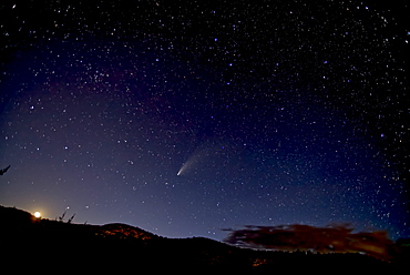 Comet NeoWise 2020 above Sullivan Butte in Chino Valley, with the Moon on the lower left and the Big Dipper in the center, Arizona, United States of America, North America