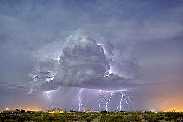 An isolated storm cell illuminated by moonlight during the 2015 Monsoon season, Arizona, United States of America, North America