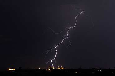 Lightning striking a powerplant in Arlington during the 2016 Monsoon season, Arizona, United States of America, North America