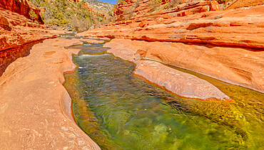 Slick rock water channel in Slide Rock State Park where most swimmers begin their slide in Oak Creek north of Sedona, Arizona, United States of America, North America