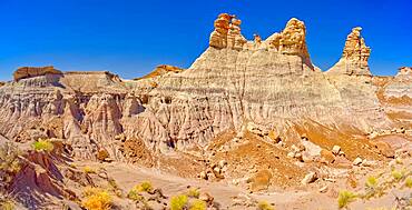 Panorama of three hoodoos shaped like kings, on the edge of the Blue Mesa in Petrified Forest National Park, Arizona, United States of America, North America