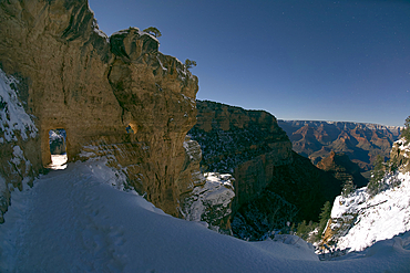 The first tunnel along Bright Angel Trail in winter under Moonlight on the South Rim of Grand Canyon, Grand Canyon National Park, UNESCO World Heritage Site, Arizona, United States of America, North America