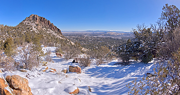 View from Picnic Hill along the Thumb Butte day use hiking trail covered in winter snow and ice, Prescott National Forest, west of Prescott, Arizona, United States of America, North America