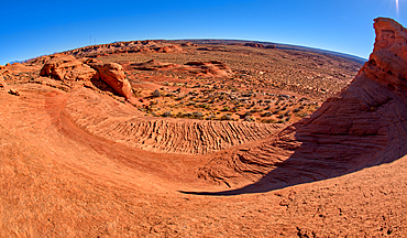 A wavy sandstone slope, a fossilized sand dune, at Ferry Swale in the Glen Canyon Recreation Area near Page, Arizona, United States of America, North America