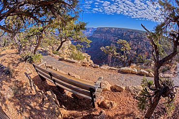 A bench along the rim trail overlooking Grand Canyon South Rim off Hermit Road, Grand Canyon, UNESCO World Heritage Site, Arizona, United States of America, North America