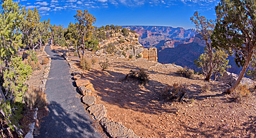 The paved rim trail along the cliffs of Grand Canyon South Rim between the Trailview Overlook East Vista and the West Vista, Grand Canyon, UNESCO World Heritage Site, Arizona, United States of America, North America