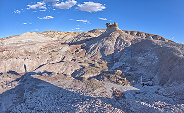 A solitary rock hoodoo in the purple badlands near Hamilili Point on the south end of Petrified Forest National Park, Arizona, United States of America, North America