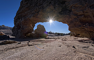 A small bentonite arch in Goblin Garden west of Hamilili Point in Petrified Forest National Park, Arizona, United States of America, North America